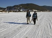 Winter trekking tour along Lake Baikal shore