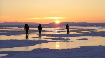 Winter trekking tour along Lake Baikal shore